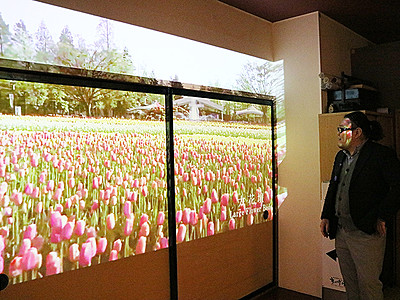 老舗宿"スマート化"　砺波「すいげつろうホテル」　ロビー壁に観光映像投影