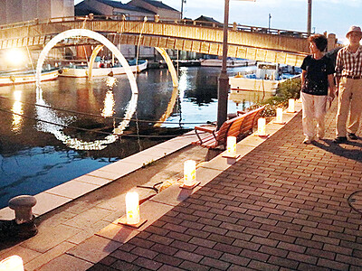 内川に幻想的な光　新湊で十楽の市開幕　手作り灯籠彩る